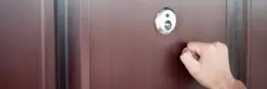 man knocking on apartment door